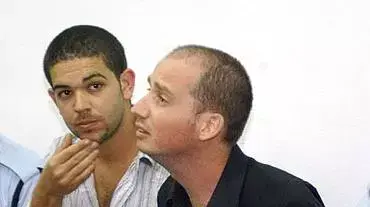 עורך העיתון גורה איציק דוידוביץ ורכז המערכת נמרוד איטקין בבית המשפט עורך העיתון גורה איציק דוידוביץ ורכז המערכת נמרוד איטקין בבית המשפט