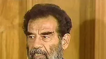סדאם חוסיין בעת חזרתו לעיראק סדאם חוסיין בעת חזרתו לעיראק