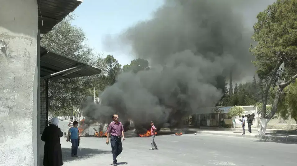 מהומה בפרבר קאבון של דמשק בעקבות הלווייתו של פעיל האופוזיציה חאלד חמדאן, שנורה על ידי כוחות צבא סוריה, 4 ביוני 2012 מהומה בפרבר קאבון של דמשק בעקבות הלווייתו של פעיל האופוזיציה חאלד חמדאן, שנורה על ידי כוחות צבא סוריה, 4 ביוני 2012