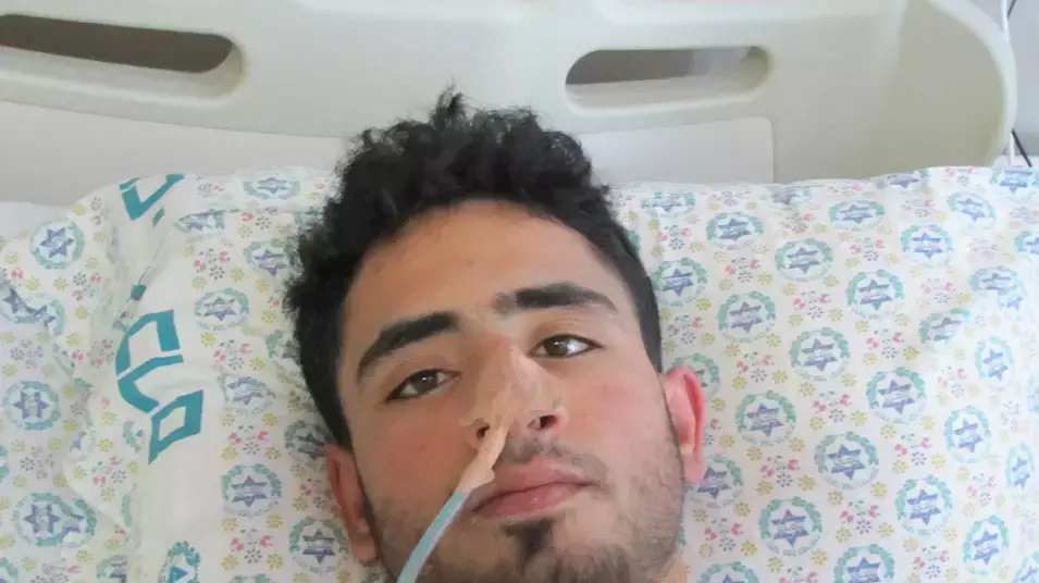 עודיי אבו מארייה, פלסטיני שהוכה ע"י צה"ל, ספטמבר 2012 עודיי אבו מארייה, פלסטיני שהוכה ע"י צה"ל, ספטמבר 2012