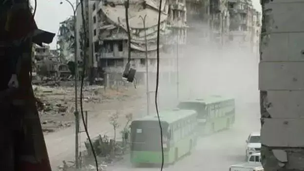 כוחות המורדים מתפנים מהעיר העתיקה של חומס, מאי 2014