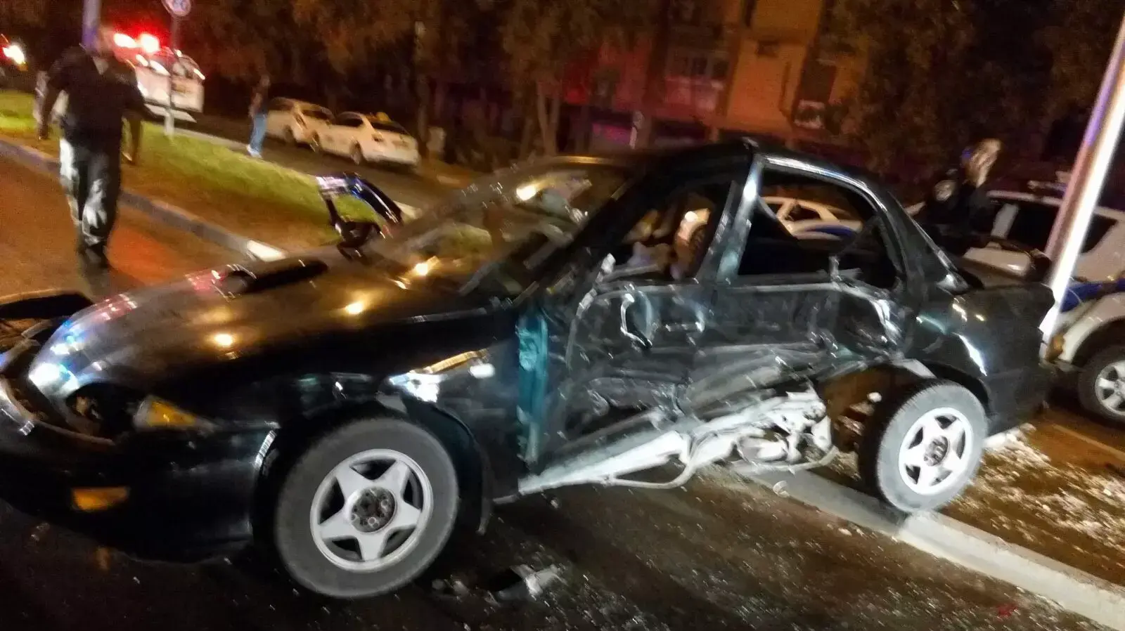 תאונת דרכים בשדרות רגר בבאר שבע במהלך מרדף של המשטרה אחרי רכב החשוד כגנוב, 27 בספטמבר 2015
