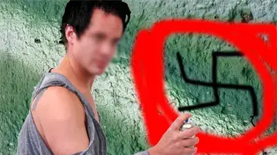 נגר מרסס צלב קרס על קיר נגר מרסס צלב קרס על קיר