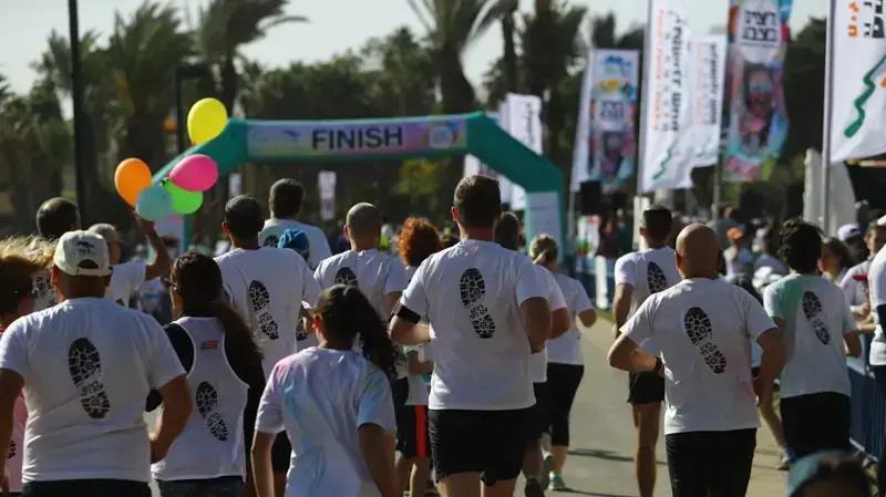התמודדות יומיומית עם החיים. קבוצת הריצה באחד מהמירוצים התמודדות יומיומית עם החיים. קבוצת הריצה באחד מהמירוצים