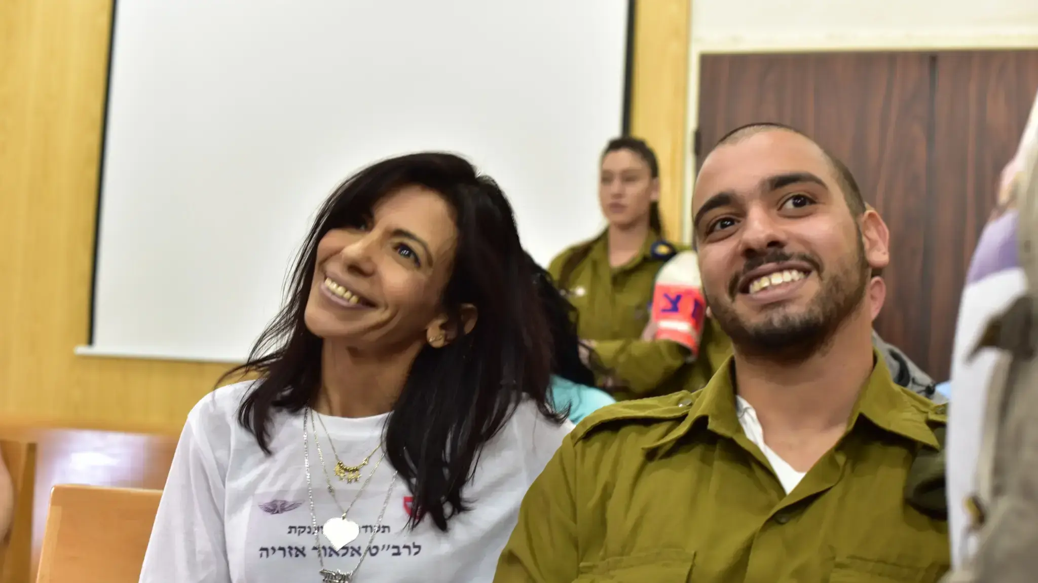 אלאור אזריה ליד הוריו בוועדת החצי שלו, קריה, תל אביב, 14 במרץ 2018
