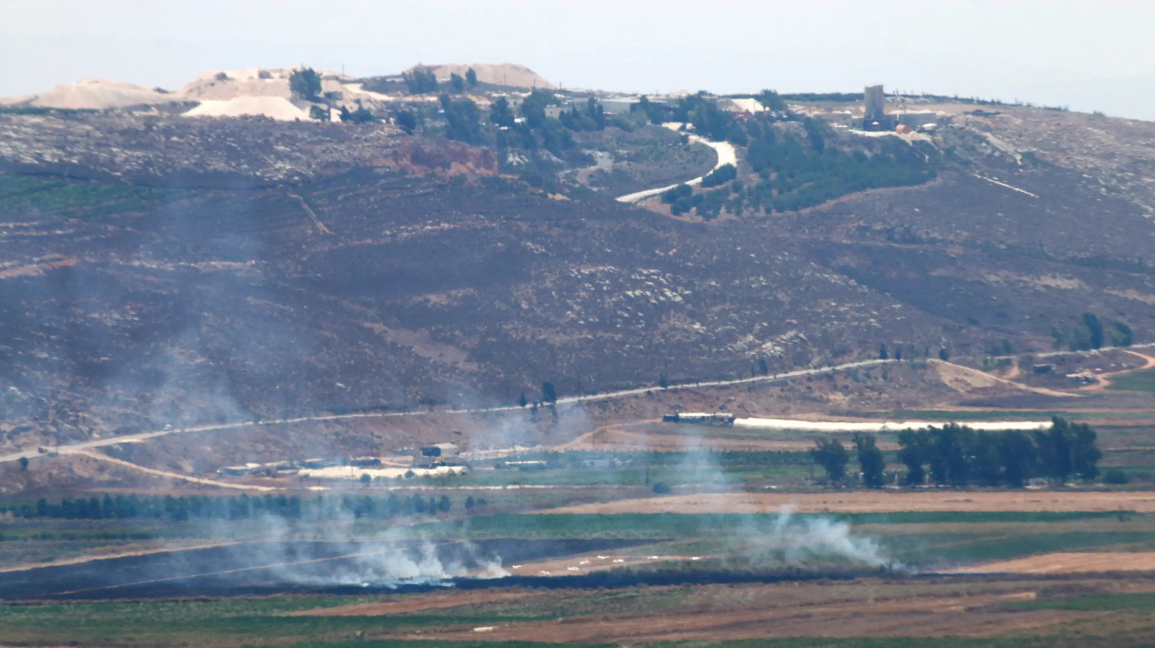 עשן במרג' עיון, לבנון, ליד הגבול עם ישראל, 6 באוגוסט 2021 עשן במרג' עיון, לבנון, ליד הגבול עם ישראל, 6 באוגוסט 2021
