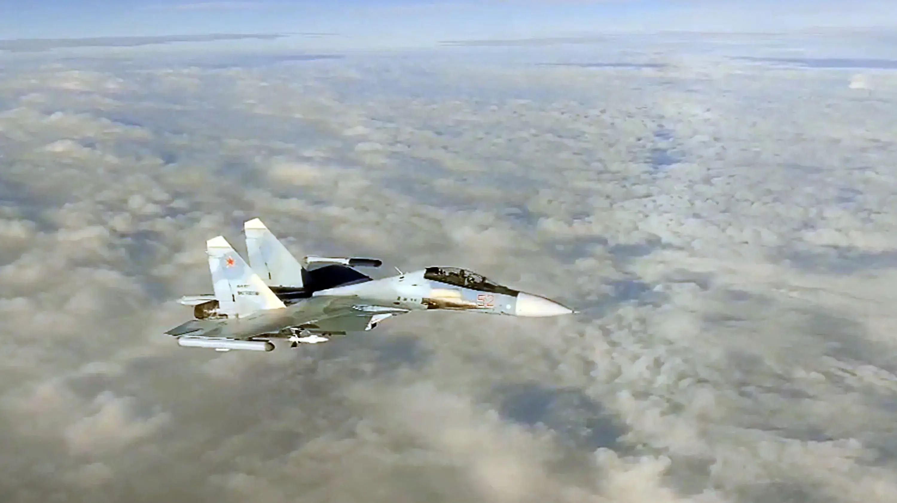 BELARUS – NOVEMBER 10, 2021: A Russian Tupolev Tu-22M3 long-range bomber flies over Belarus to practice cooperation with command posts of the Russian and Belarusian armed forces and check the Union State air defense system. BELARUS – NOVEMBER 10, 2021: A Russian Tupolev Tu-22M3 long-range bomber flies over Belarus to practice cooperation with command posts of the Russian and Belarusian armed forces and check the Union State air defense system.