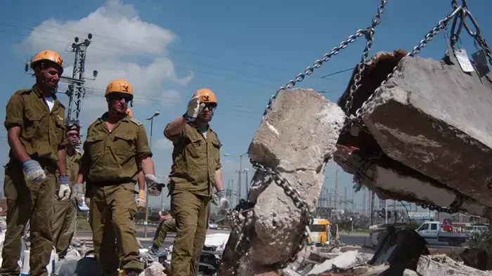 תרגיל שנתי של יחידת החילוץ וההצלה הארצית של פיקוד העורף, במסגרתו תרגלו חילוץ לכודים במבנה שקרס תרגיל שנתי של יחידת החילוץ וההצלה הארצית של פיקוד העורף, במסגרתו תרגלו חילוץ לכודים במבנה שקרס