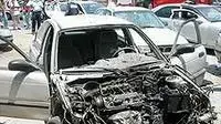 מכונית הרוסה מפיצוץ שהתרחש בגני התערוכה הישנים בתל אביב ( מתוך אתר המשטרה הרשמי ) מכונית הרוסה מפיצוץ שהתרחש בגני התערוכה הישנים בתל אביב ( מתוך אתר המשטרה הרשמי )