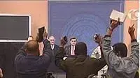 עיתונאים בפרץ שמחה עם ההודעה כי סדאם נלכד (ערוץ 10) עיתונאים בפרץ שמחה עם ההודעה כי סדאם נלכד (ערוץ 10)